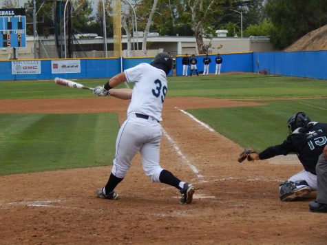 Pinch hitter Daniel Cipriano hits into a double play with the bases loaded to end a Raider threat in the seventh inning against the Cuesta College Cougars on Saturday.