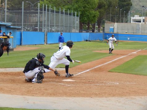 Shortstop Terrell Tate's RBI single to center drives home the runner from third base to tie the game 2-2 in the eighth inning against Cuesta College at Raiders Stadium, Saturday.