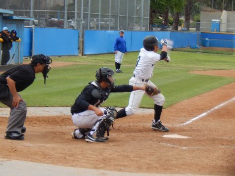 Second baseman Garrett Kueber's single to left delivers the winning run from second for Moorpark after an epic battle in the ninth inning against Cuesta College on Saturday.