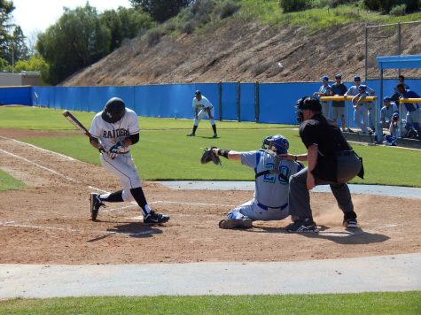 Moorpark second baseman Garrett Kueber is hit in the face by a pitch in the second inning against the Oxnard College Condors at Raiders Stadium, Saturday. The Condors won 6-4.