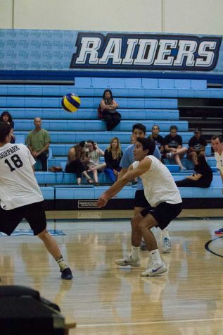 JULIE FENNELL/MOORPARK COLLEGE Owen Yoshimoto (#11) of Moorpark College receives a hit from SBCC in Game 2 at home on Friday, April 1, 2016. Raiders took home a win of 3-1. 4-1-2016