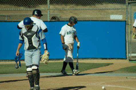 JULIE FENNELL/MOORPARK COLLEGE Moorpark College prepares to send up another batter against Oxnard after a tough tag is applied by Oxnard's catcher in a home game on Thursday, April 21 Moorpark won 11-4.