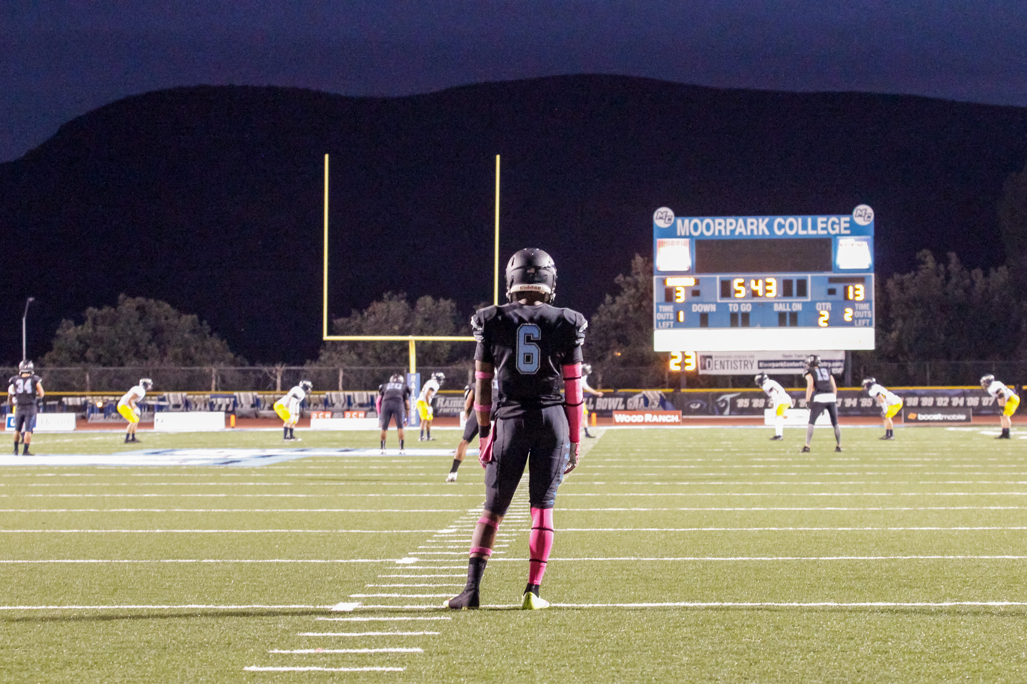 Raider defensive back TJ Newborn awaits a kickoff in the second quarter of Saturday's game. Newborn added an interception on defense in addition to four returns in 101 yards. 